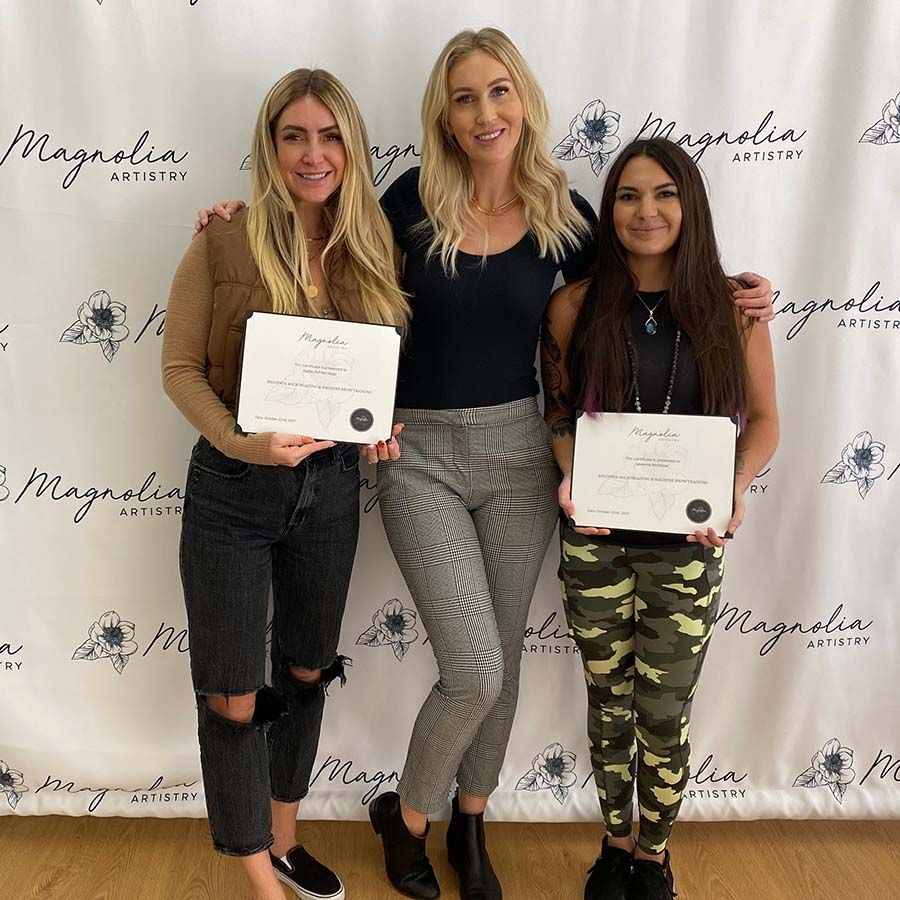 Natalia with two certified students
